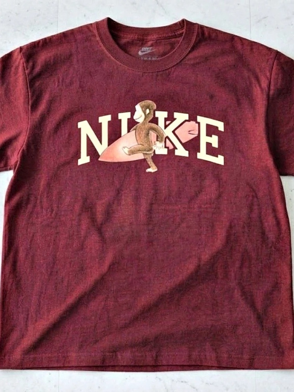 Gildan reprinted Nike Short Sleeve Graphic Tee in antique cherry red